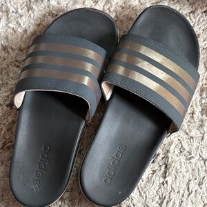 Adidas Black Slides with Metallic Stripes